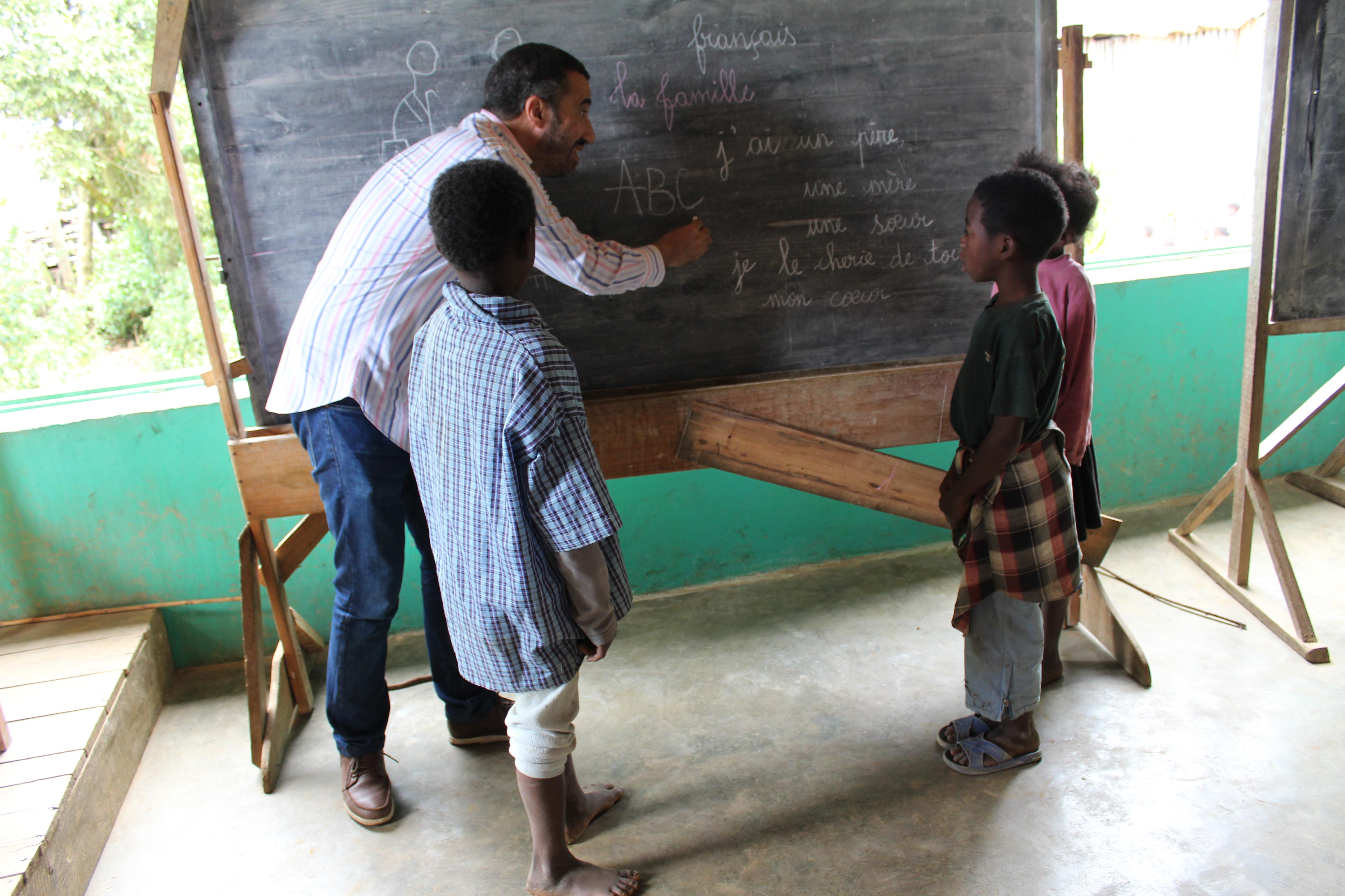 Students volunteer on a Teaching Project before the start of their Projects Abroad French Language Course in Madagascar. While learning French in Madagascar, students also have the option to volunteer on a Teaching Project and work with children.